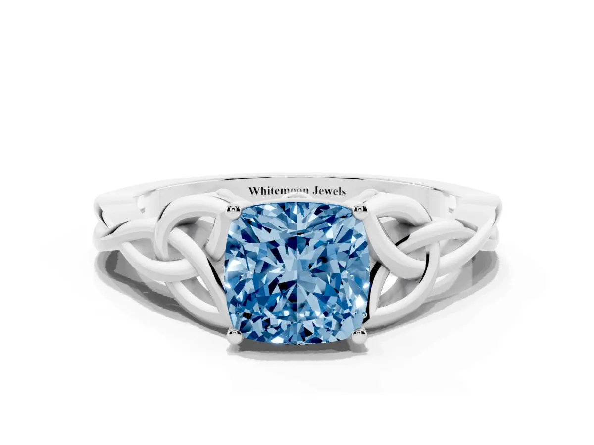 Fancy Blue Cushion Cut Diamond Solitaire Engagement Ring with Celtic Knot Band and Four-Prong Setting Silver