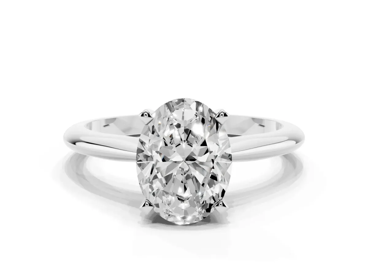 Oval Cut Cut Solitaire Ring with Four-Prong Setting on a Classic Band Platinum