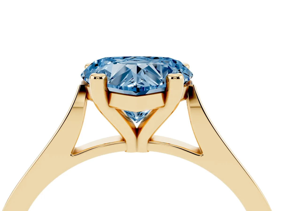 Fancy Blue Heart Cut Solitaire Diamond Ring with Four-Prong Setting and Tapered Band Yellow gold