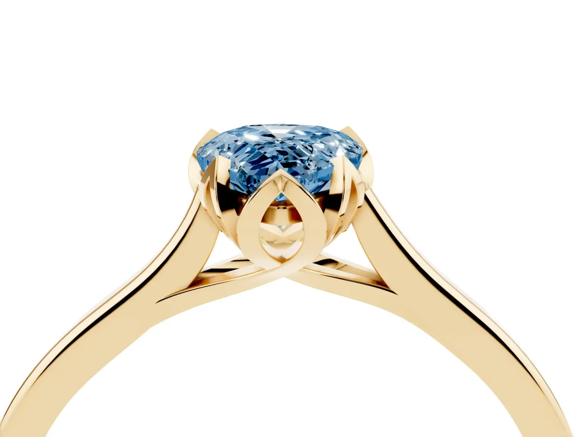 Fancy Blue Pear Cut Diamond Solitaire Ring with Flower Prong Setting and Classic Band Yellow gold