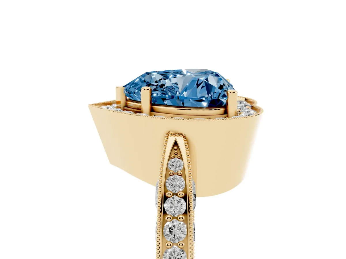 Fancy Blue Heart Cut Halo Diamond Engagement Ring with Split Shank Band and Four-Prong Setting Yellow gold