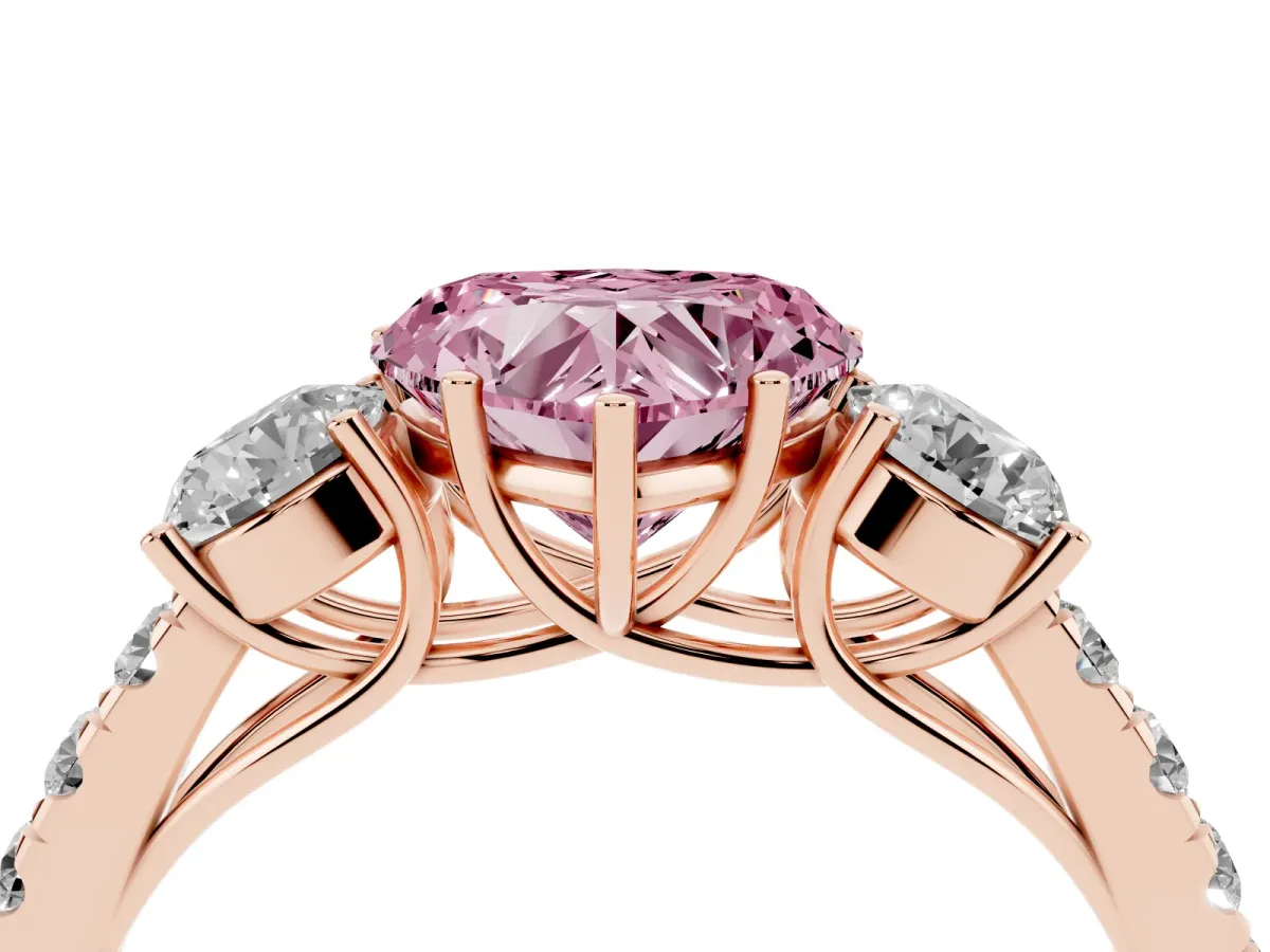 Fancy Pink Heart Cut Cut Diamond Three-Stone Ring with Round Side Stones and Pavé Band Rose gold