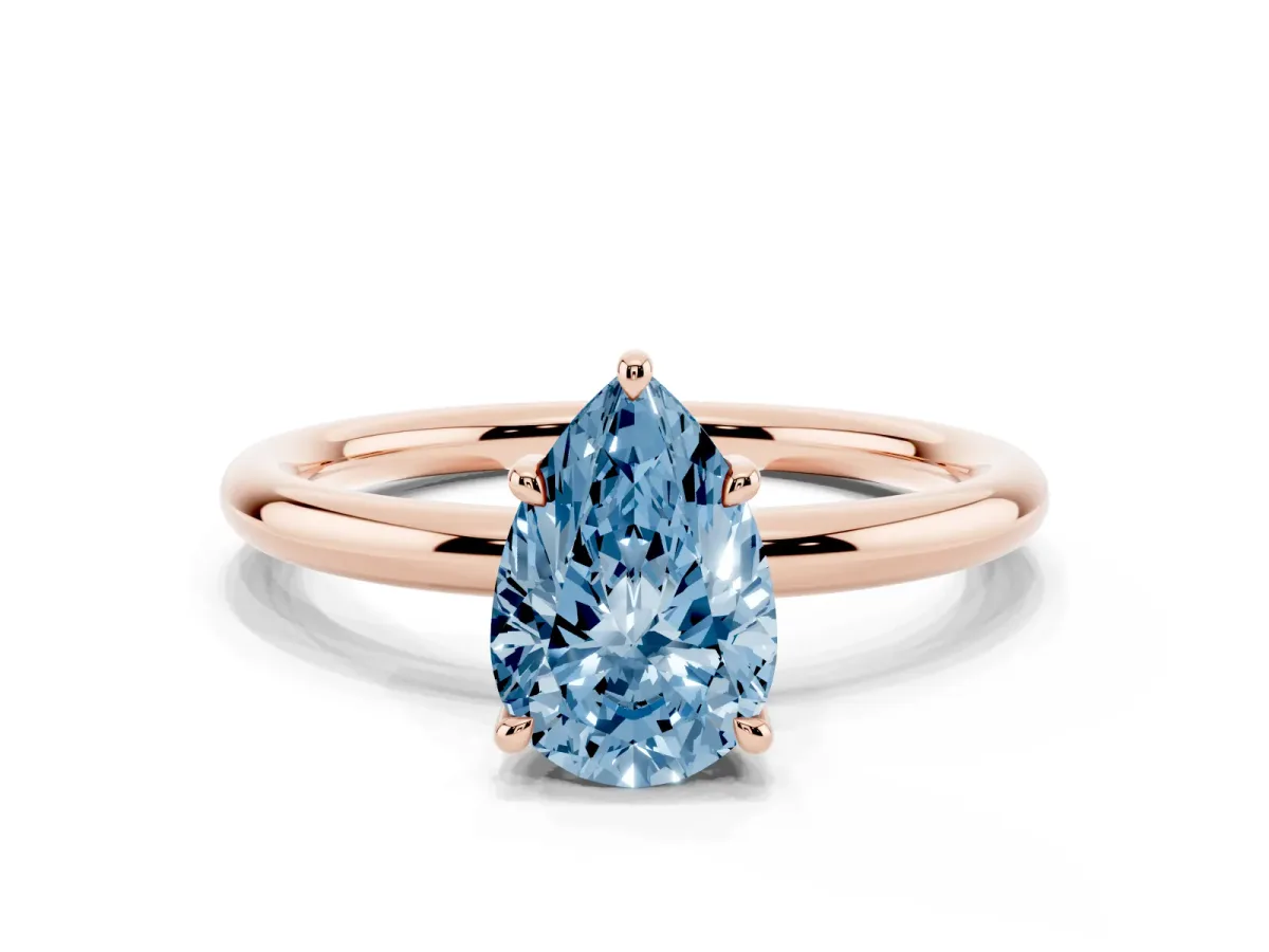 Fancy Blue Pear Cut Diamond Solitaire Ring with Thin Band and Four-Prong Setting Rose gold