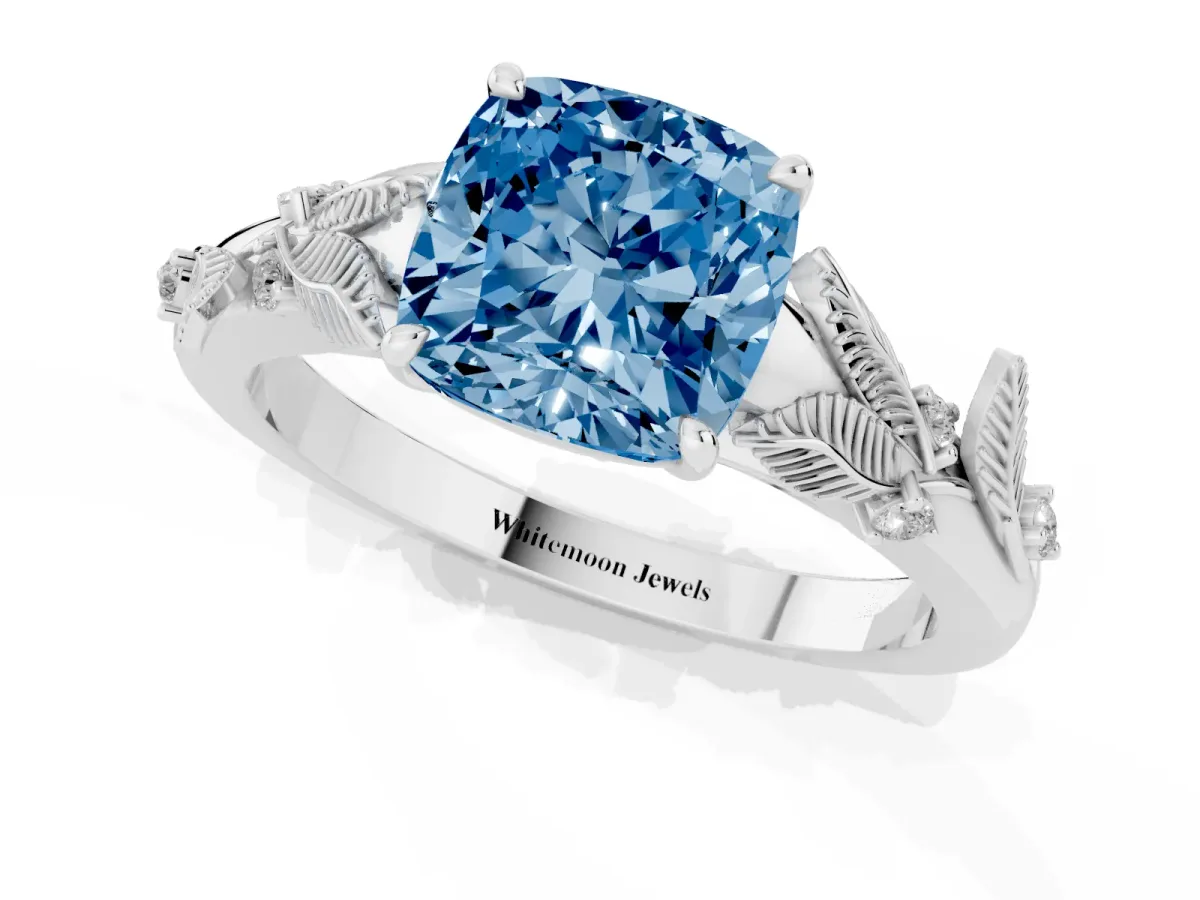 Fancy Blue Cushion Cut Diamond Solitaire Ring with Leaf Motif Band and Four-Prong Setting Silver