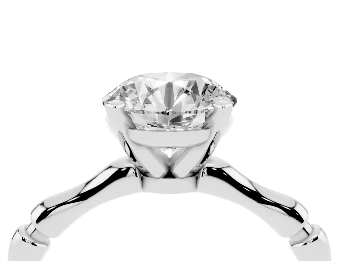 Round Cut Solitaire Diamond Ring with Bamboo Band and Four-Prong Setting Silver