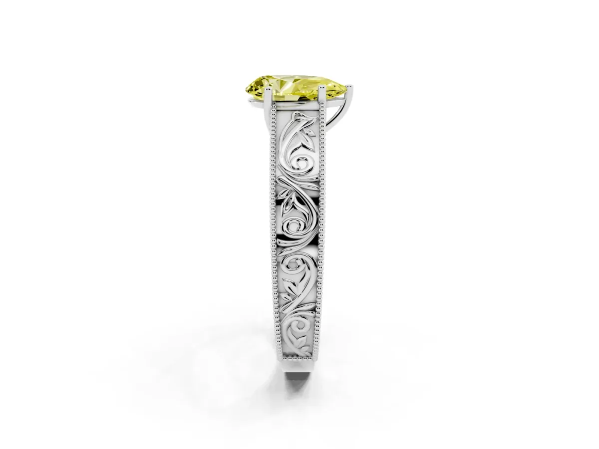 Fancy Yellow Pear Cut Diamond Solitaire Ring with Engraved Band and Four-Prong Setting Silver