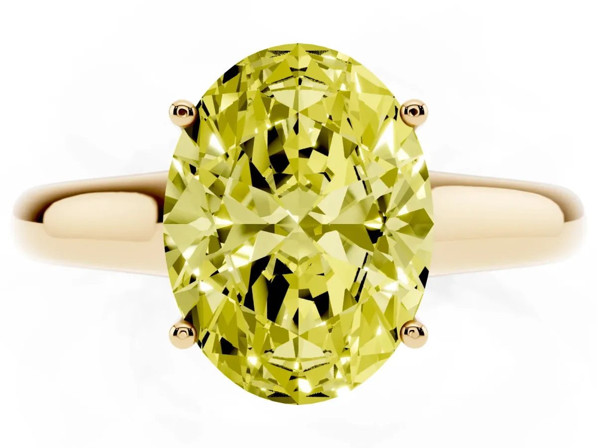 Fancy Yellow Oval Cut Solitaire Engagement Ring with Tapered Band and Four-Prong Setting Yellow gold