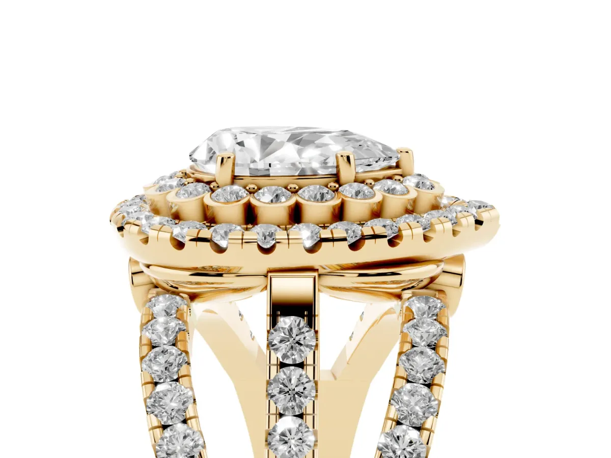 Pear Cut Diamond Double Halo Ring with Round Pavé Split Shank and Prong Setting Yellow gold