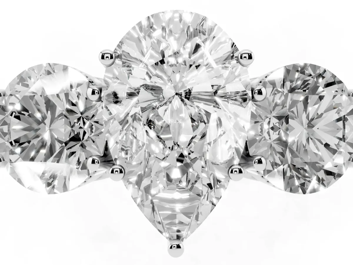 Three-Stone Pear Cut Diamond Engagement Ring with Prong Setting on a Classic Band Silver