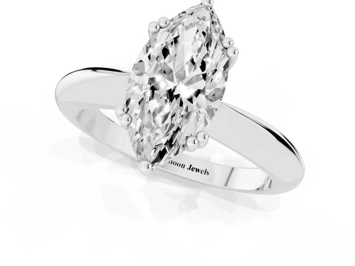 Marquise Cut Cut Solitaire Engagement Ring with Tapered Band and Four-Prong Setting White gold