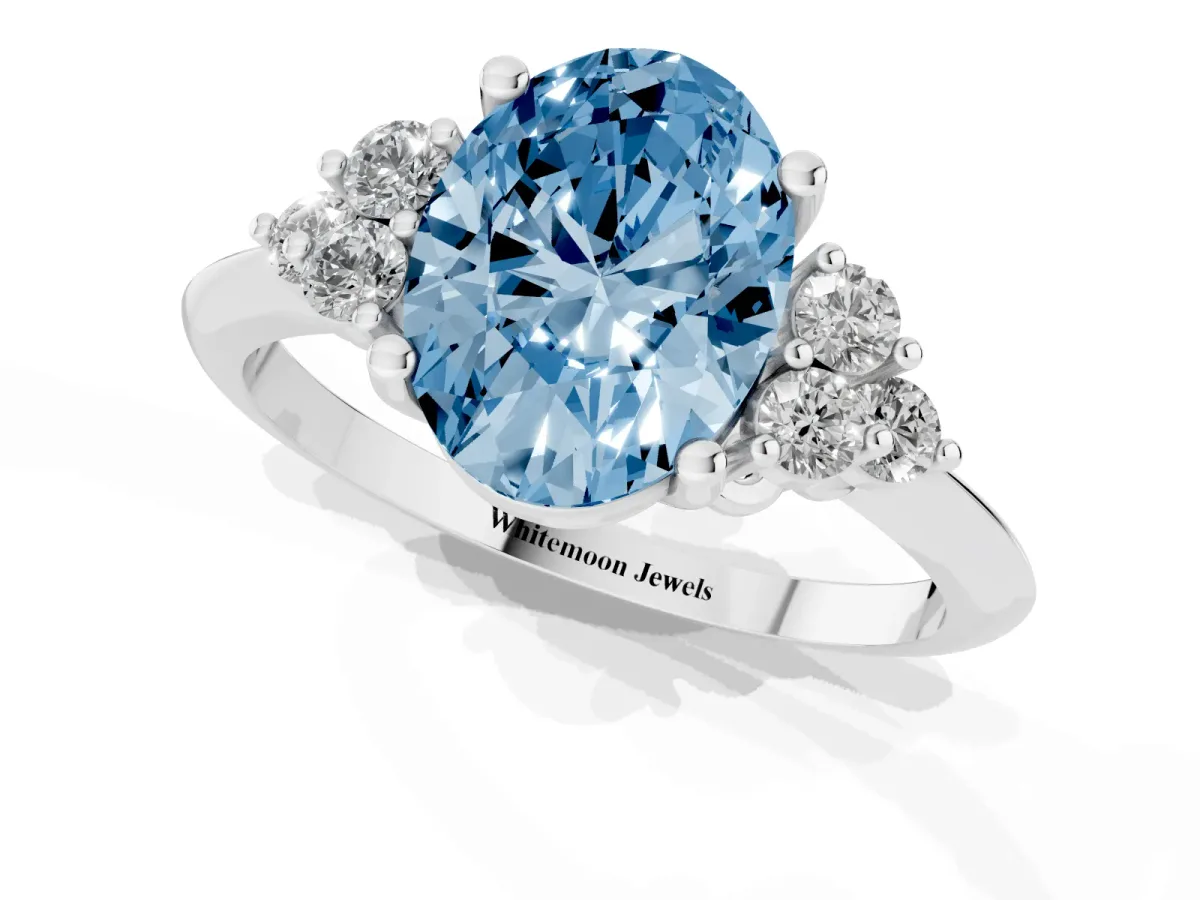 Fancy Blue Oval Cut Cut Diamond Cluster Ring with Solitaire Band and Four-Prong Setting Silver