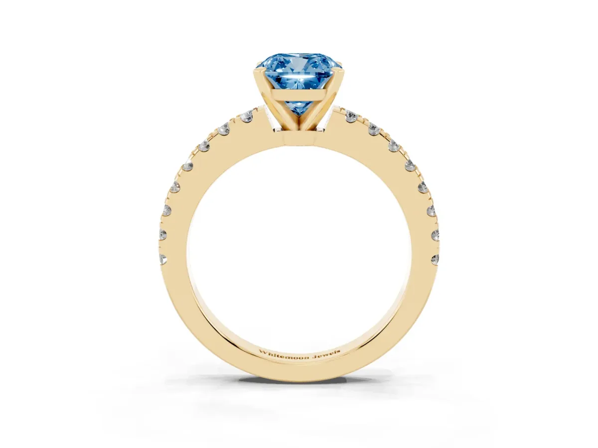 Fancy Blue Cushion Cut Solitaire Diamond with Pavé Band and Four-Prong Setting Yellow gold