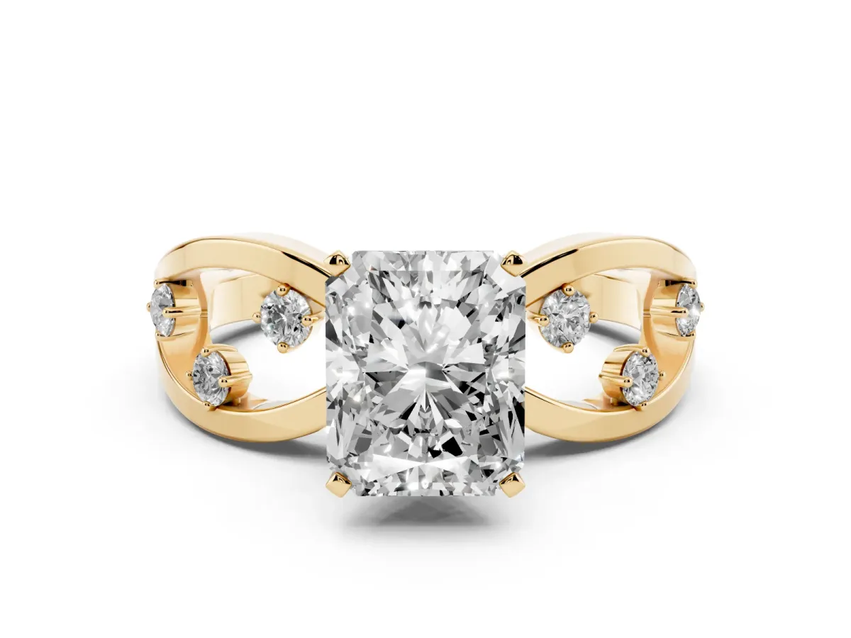 Radiant Cut Cut Solitaire Diamond with Side Stones on Criss-Cross Band and Four-Prong Setting Yellow gold