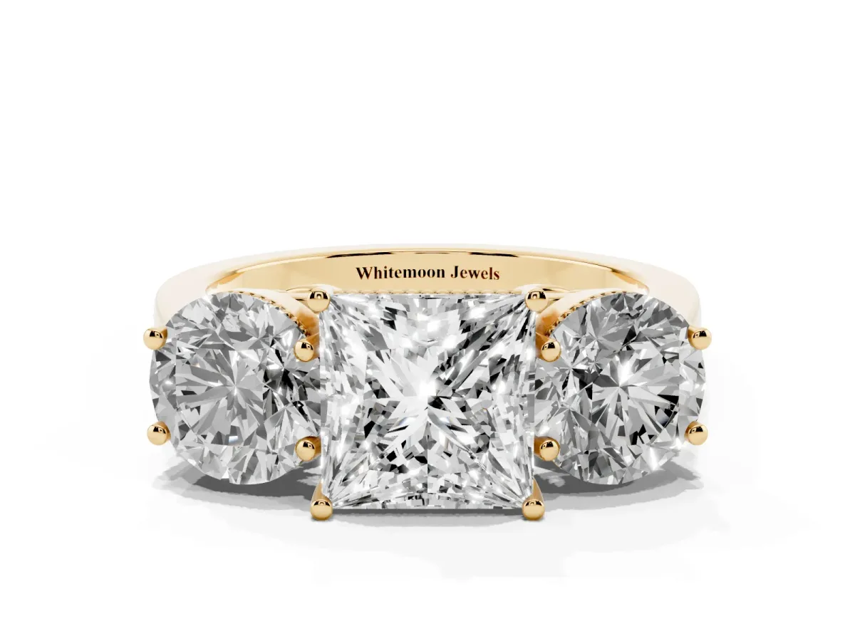 Three-Stone Princess Cut Diamond Engagement Ring with Prong Setting on a Classic Band Yellow gold