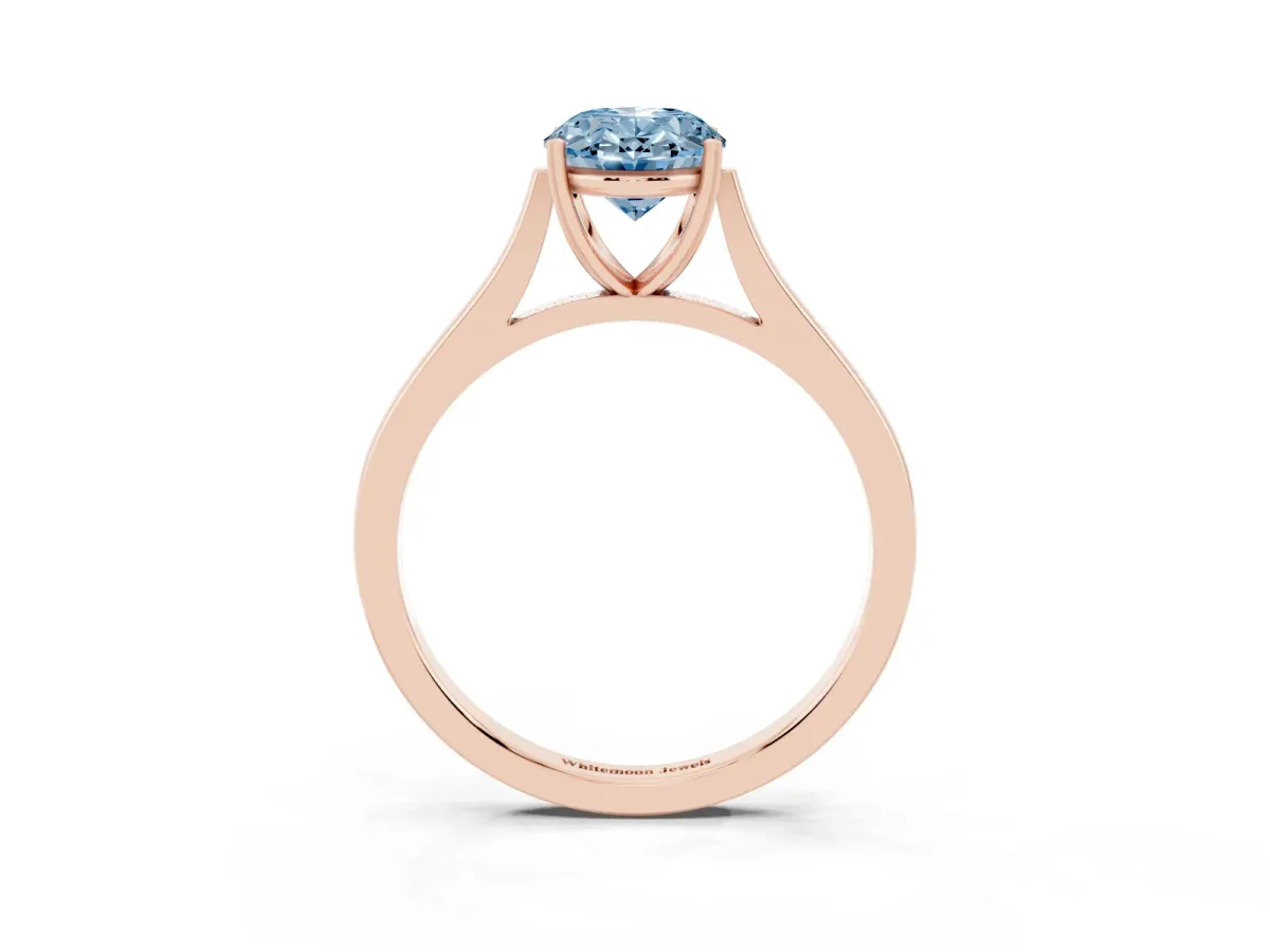 Fancy Blue Oval Cut Solitaire Heart Prong Engagement Ring with Tapered Band Rose gold