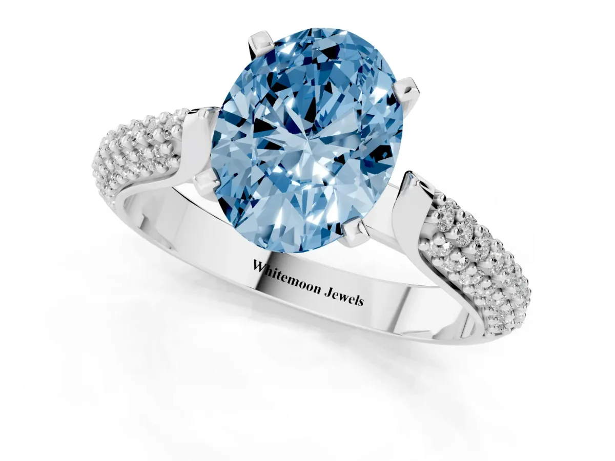 Fancy Blue Oval Cut Diamond Solitaire Engagement Ring with Multi-Row Round Pavé Band and Prong Setting Silver