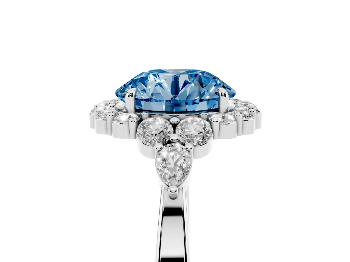 Fancy Blue Round Cut Diamond Halo Ring with Pear Side Stones and Prong Setting Silver