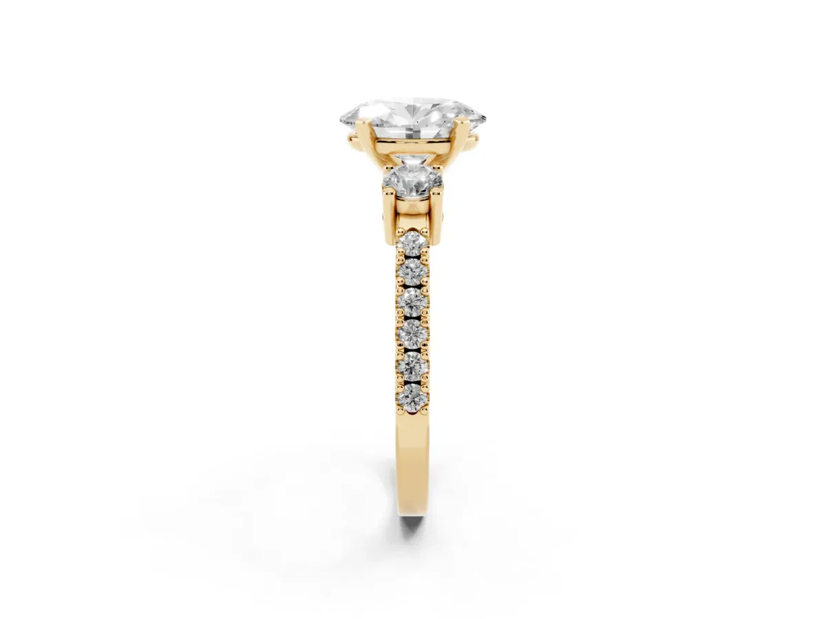 Oval Cut Three-Stone Diamond Pavé Band with Prong Setting Yellow gold