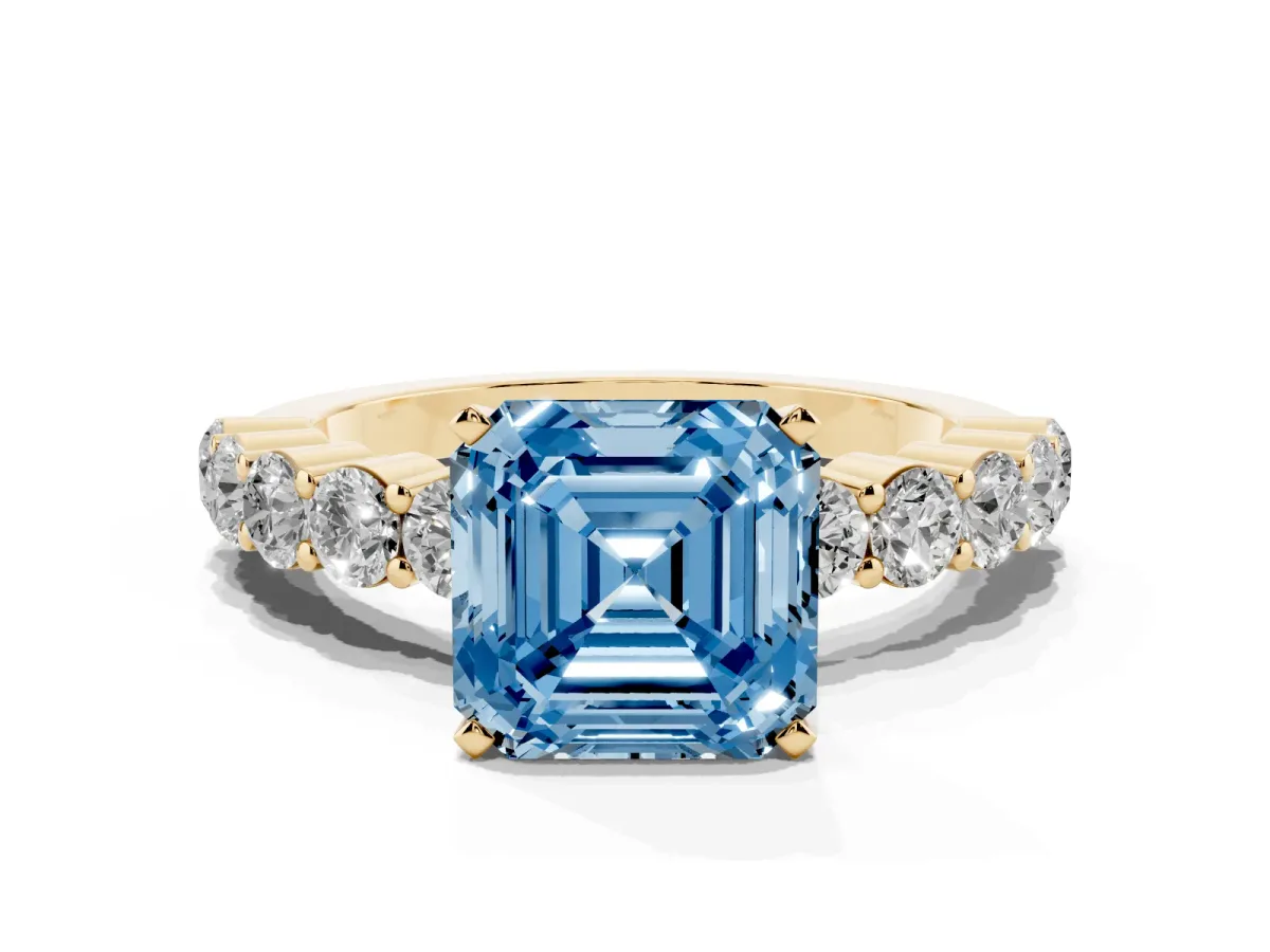 Fancy Blue Asscher Cut Diamond Solitaire Ring with Shared Prong Round Side Stones Yellow gold