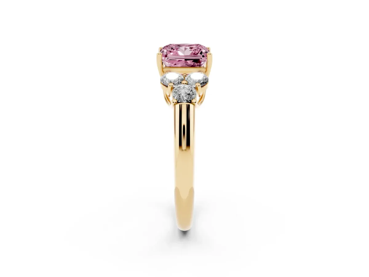 Fancy Pink Princess Cut Cut Diamond Cluster Ring with Round Accent Stones and Prong Setting on a Classic Band Yellow gold