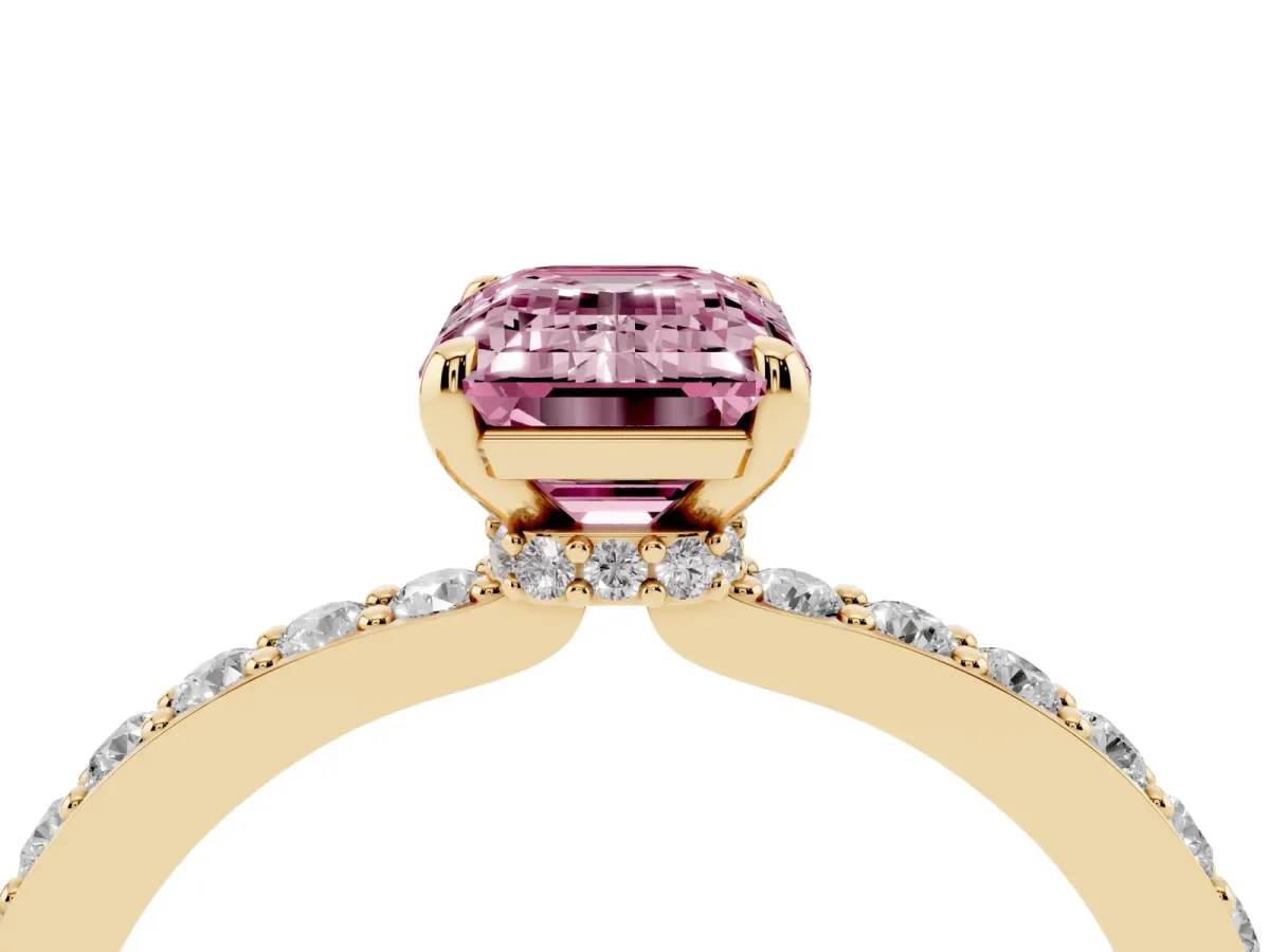 Fancy Pink Emerald Cut Diamond Solitaire Engagement Ring with Pavé Band and Four-Prong Setting Yellow gold
