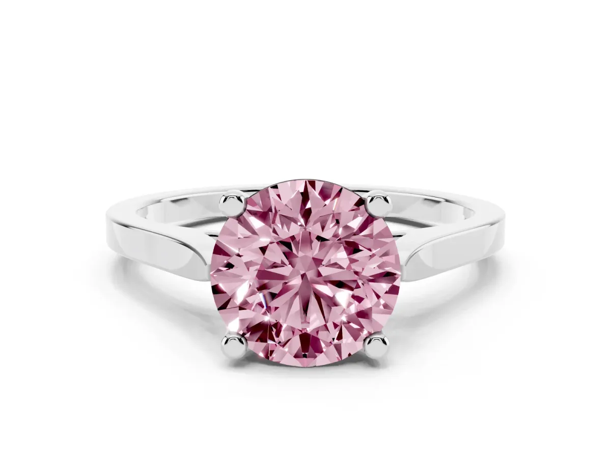 Fancy Pink Round Cut Solitaire Diamond Ring with Four-Prong Setting and Tapered Band Platinum