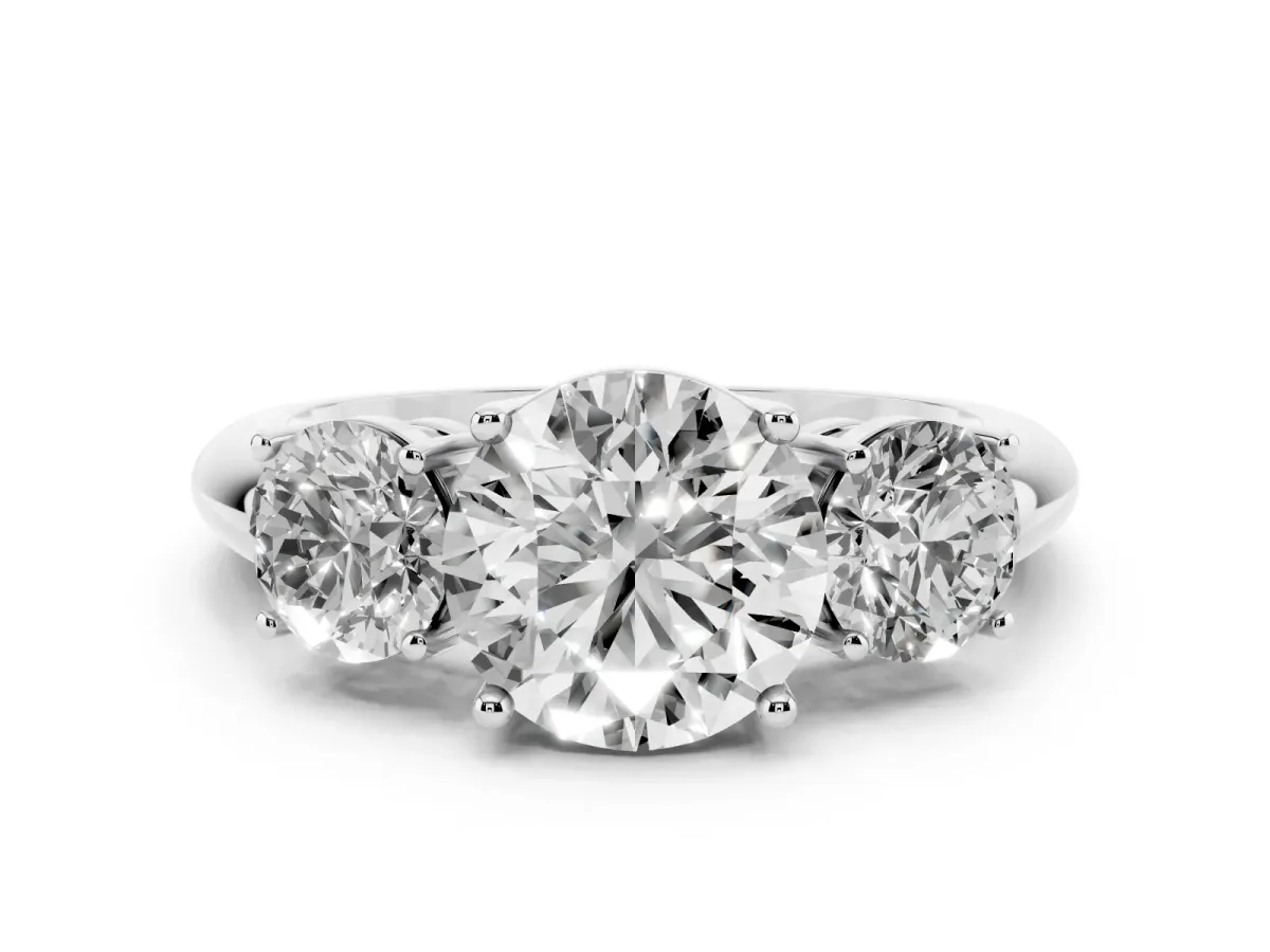 Three-Stone Round Cut Cut Diamond Engagement Ring with Prong Setting on a White Gold Band Platinum
