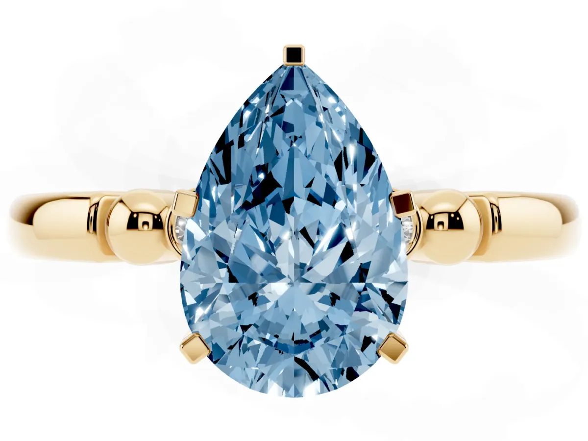 Fancy Blue Pear Cut Solitaire Beaded Band with Four-Prong Setting Yellow gold
