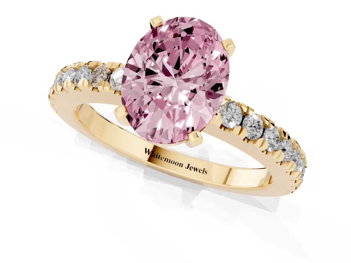 Fancy Pink Oval Cut Solitaire Diamond with Pavé Band and Four-Prong Setting Yellow gold