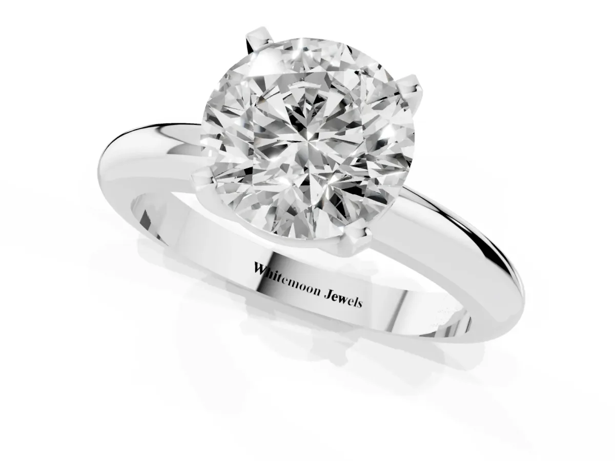 Round Cut Diamond Solitaire Engagement Ring with Round Band and Four-Prong Setting Platinum