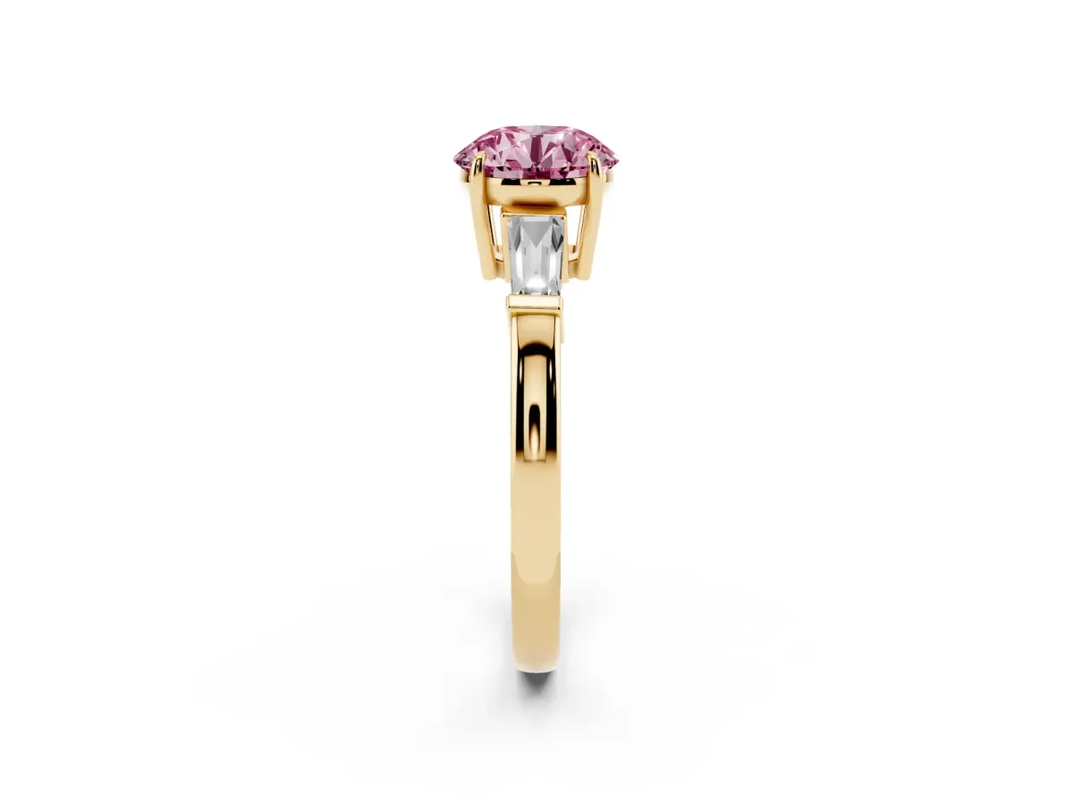 Fancy Pink Round Cut Diamond Three-Stone Ring with Tapered Baguette Side Stones and Prong Setting Yellow gold