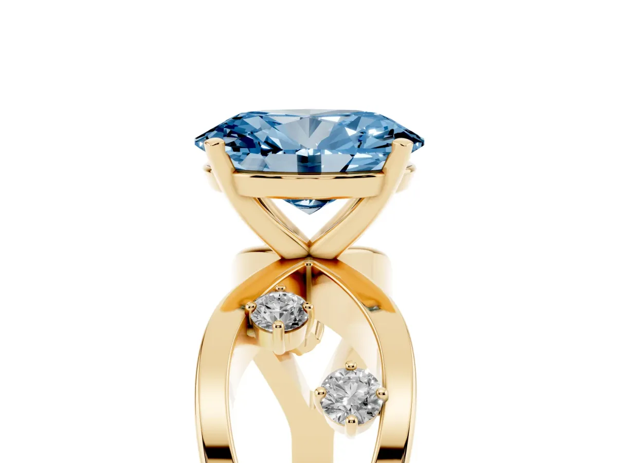 Fancy Blue Oval Cut Cut Solitaire Diamond with Side Stones on Criss-Cross Band and Four-Prong Setting Yellow gold
