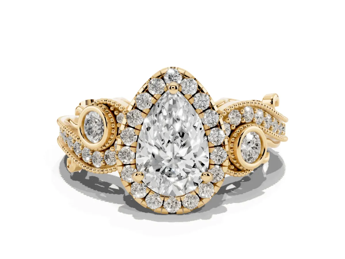 Pear Cut Halo Diamond Ring with Milgrain and Bezel Accents on a Split Shank Band Yellow gold
