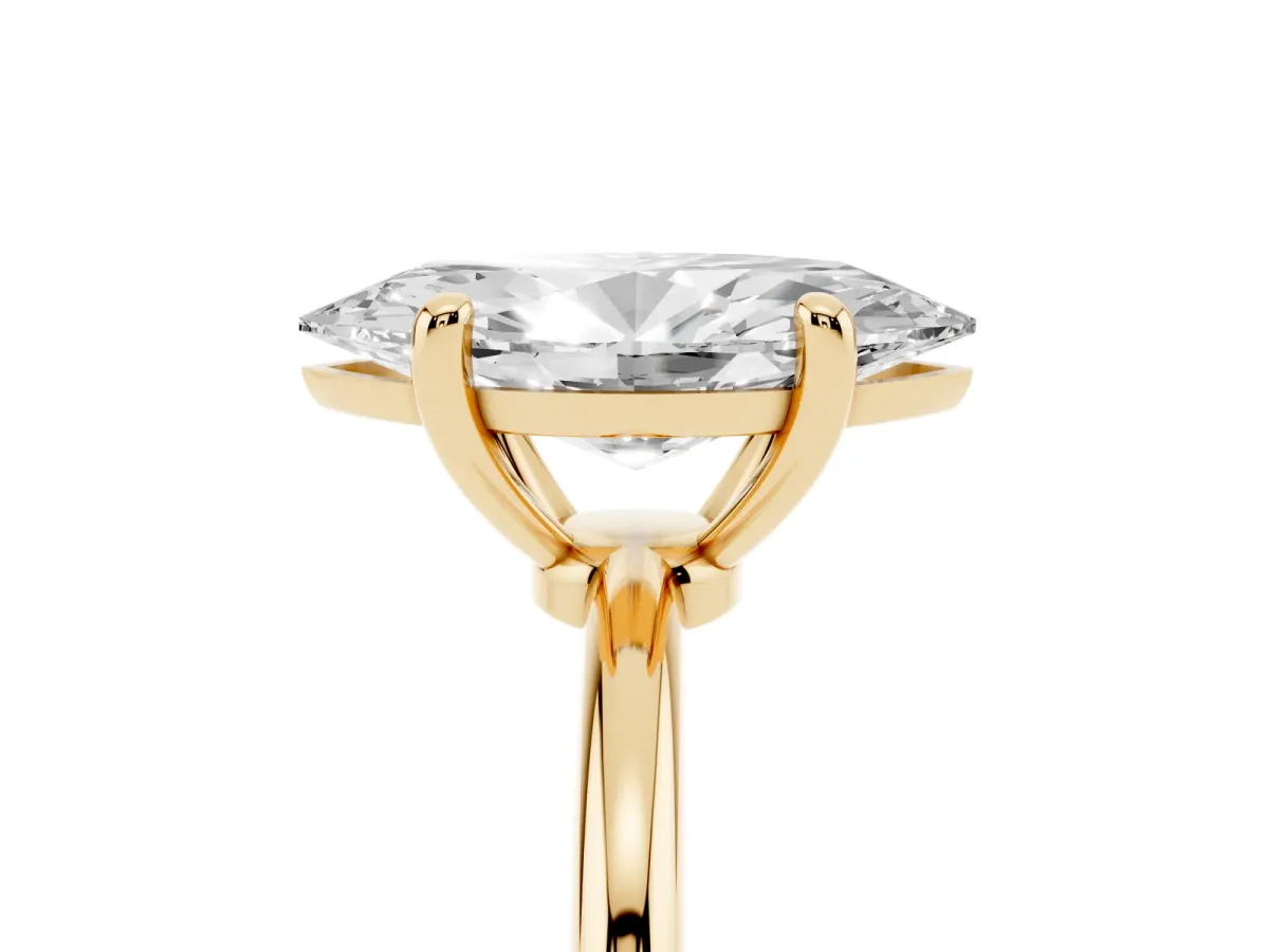 Marquise Cut Solitaire Diamond Ring with 4-Prong Setting on a Classic Band Yellow gold