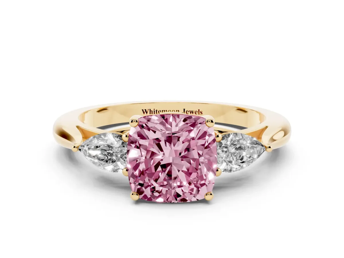 Fancy Pink Cushion Cut Diamond Three-Stone Ring with Pear Side Stones and Prong Setting Yellow gold