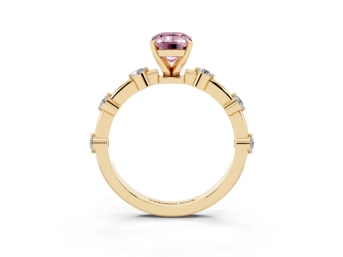 Fancy Pink Emerald Cut Solitaire Diamond Ring with Bezel Set Side Stones and Prong Setting Yellow gold