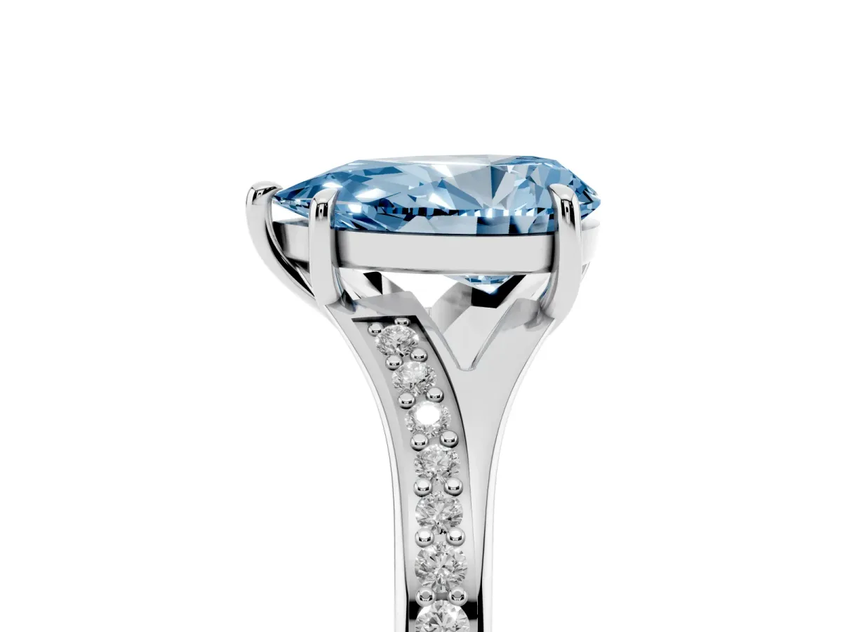 Fancy Blue Pear Cut Diamond Solitaire Ring with Pavé Band and Prong Setting Silver