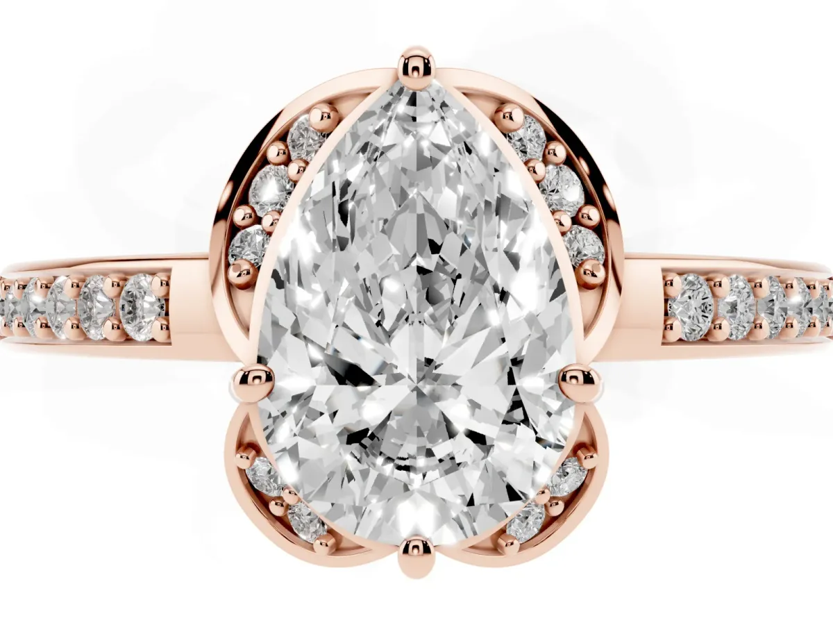 Pear Cut Cut Halo Diamond Ring with Channel Set Band and Four-Prong Setting Rose gold