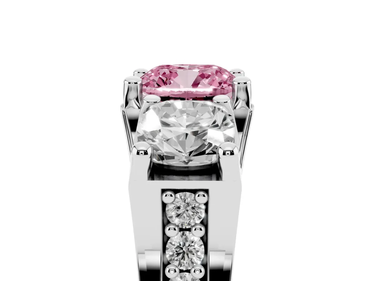 Fancy Pink Cushion Cut Diamond Three-Stone Ring with Channel Set Band and Four-Prong Setting Platinum