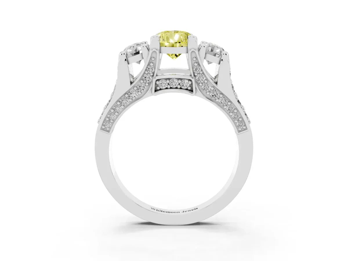 Fancy Yellow Pear Cut Diamond Three-Stone Ring with Channel Set Band and Four-Prong Setting Silver