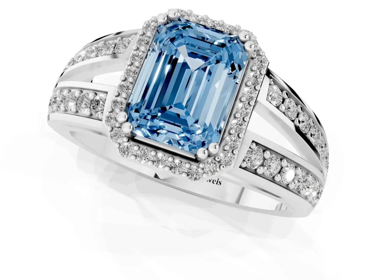 Fancy Blue Emerald Cut Diamond Halo Ring with Split Shank Pavé Band and Four-Prong Setting White gold