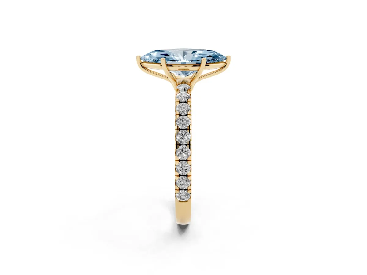 Fancy Blue Marquise Cut Diamond Pavé Solitaire Engagement Ring with Four-Prong Setting Yellow gold