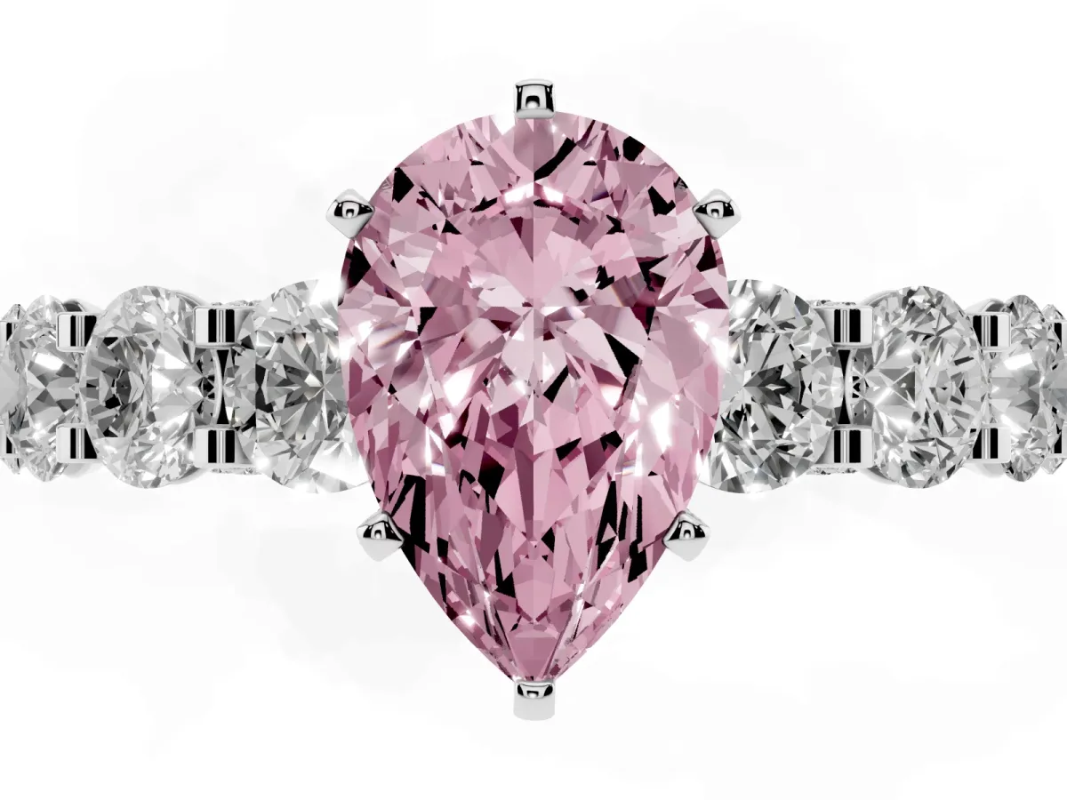 Fancy Pink Pear Cut Diamond Side Stone Engagement Ring with Four-Prong Setting Platinum