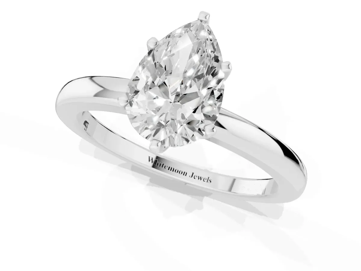 Pear Cut Solitaire Diamond Ring with Six-Prong Setting on a Classic Band Platinum