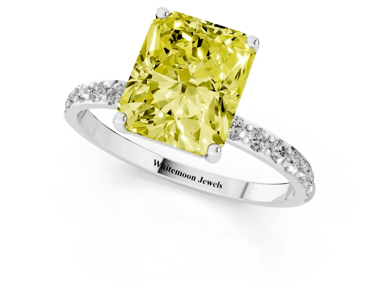 Fancy Yellow Radiant Cut Diamond Solitaire Ring with Round Pavé Shoulders and Prong Setting Silver