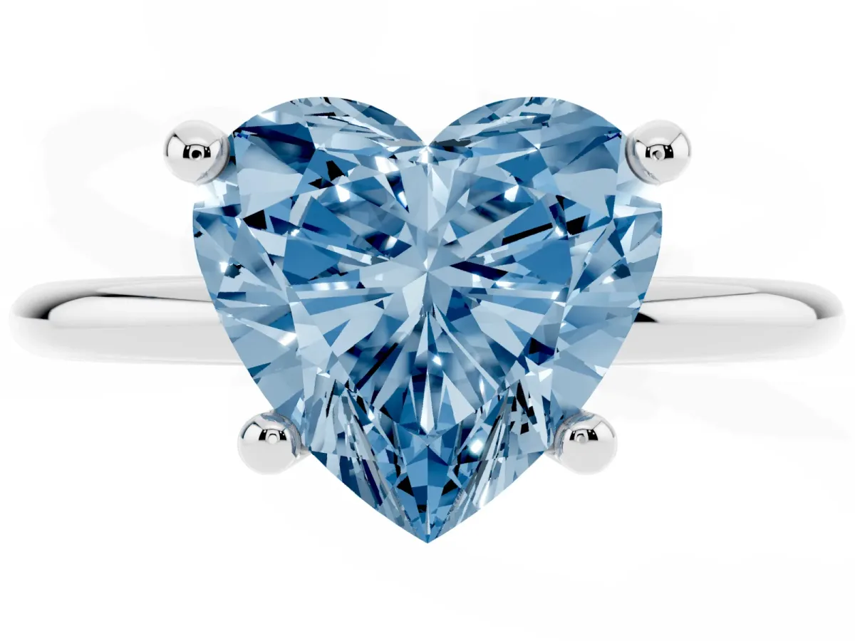 Fancy Blue Heart Cut Solitaire Diamond Ring with 4-Prong Setting on a Classic Band Silver