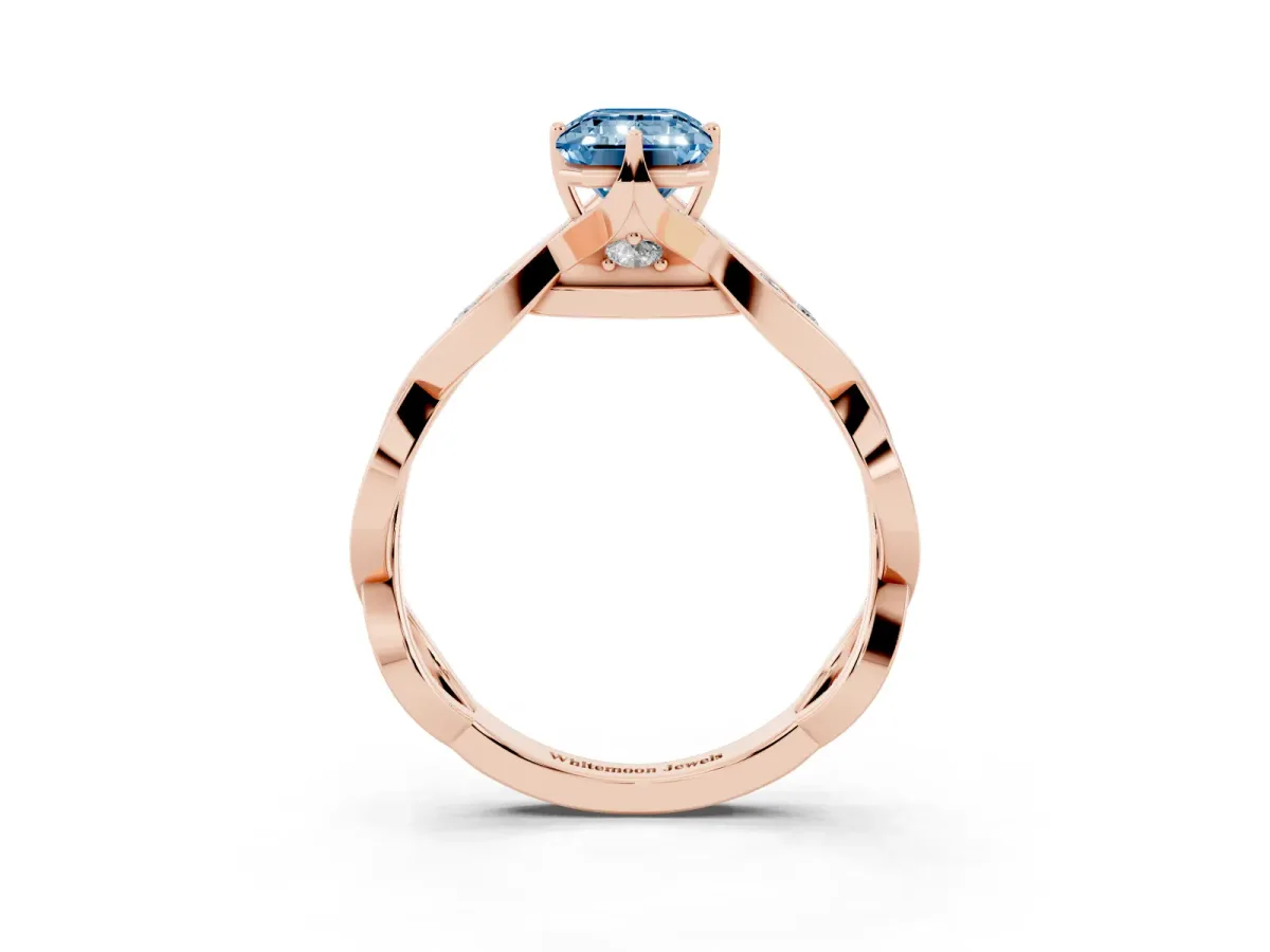 Fancy Blue Emerald Cut Solitaire Twist Band with Leaf Prong Setting Rose gold