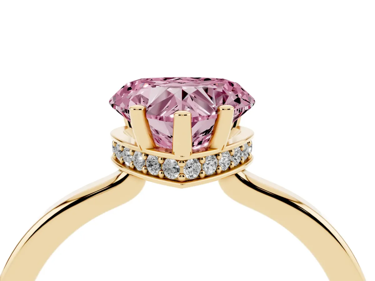 Fancy Pink Heart Cut Cut Solitaire Engagement Ring with Four-Prong Setting on a Classic Band Yellow gold