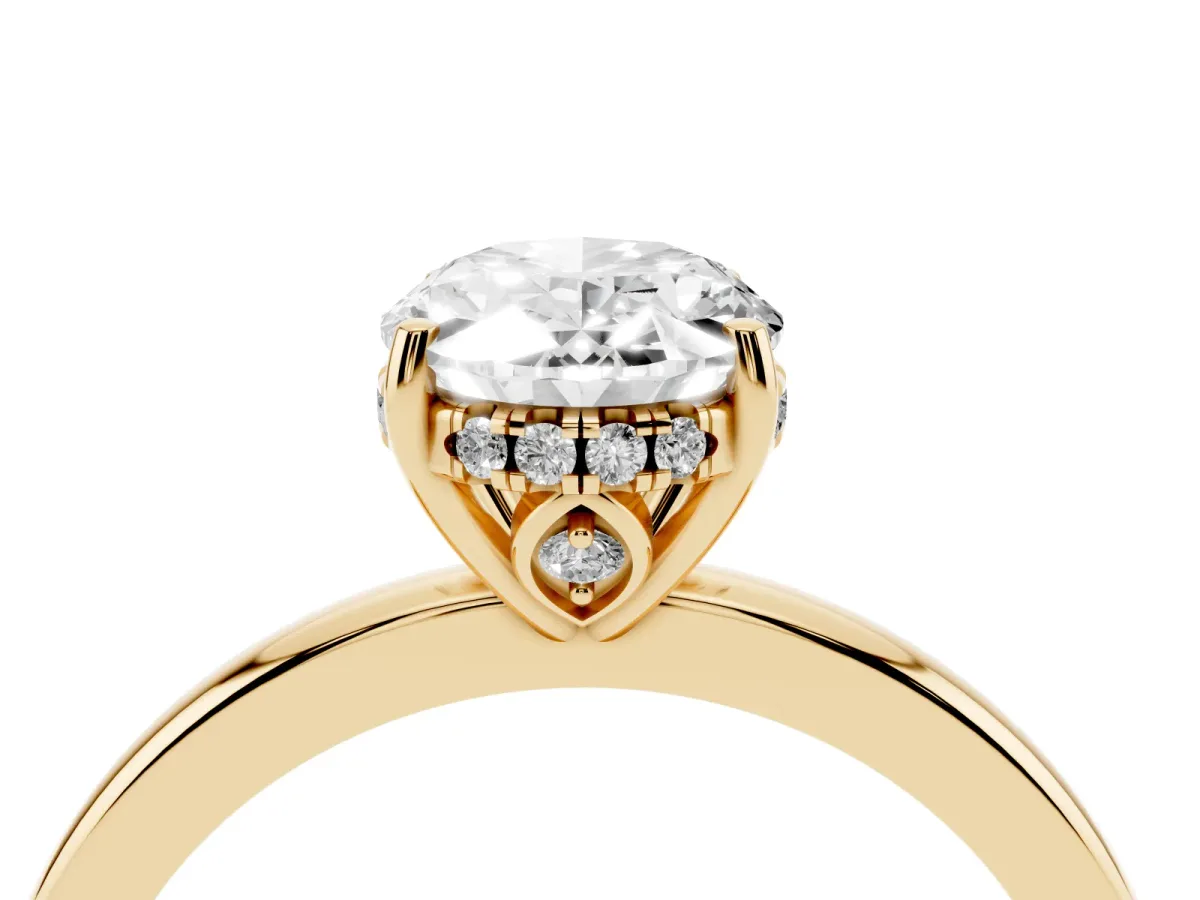 Oval Cut Solitaire Diamond Ring with Prong Setting and Plain Band Yellow gold