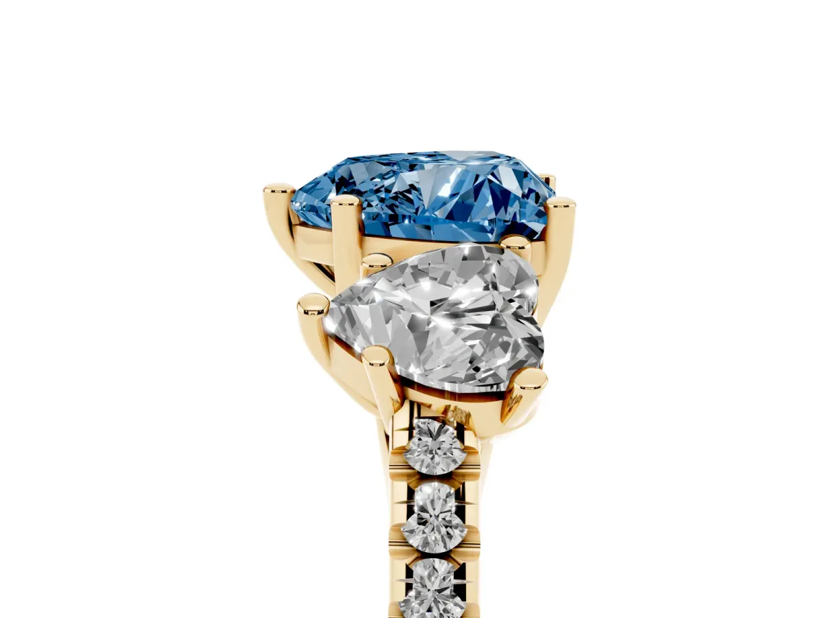 Fancy Blue Three-Stone Heart Cut Diamond Ring with Round Pavé Band and Prong Setting Yellow gold